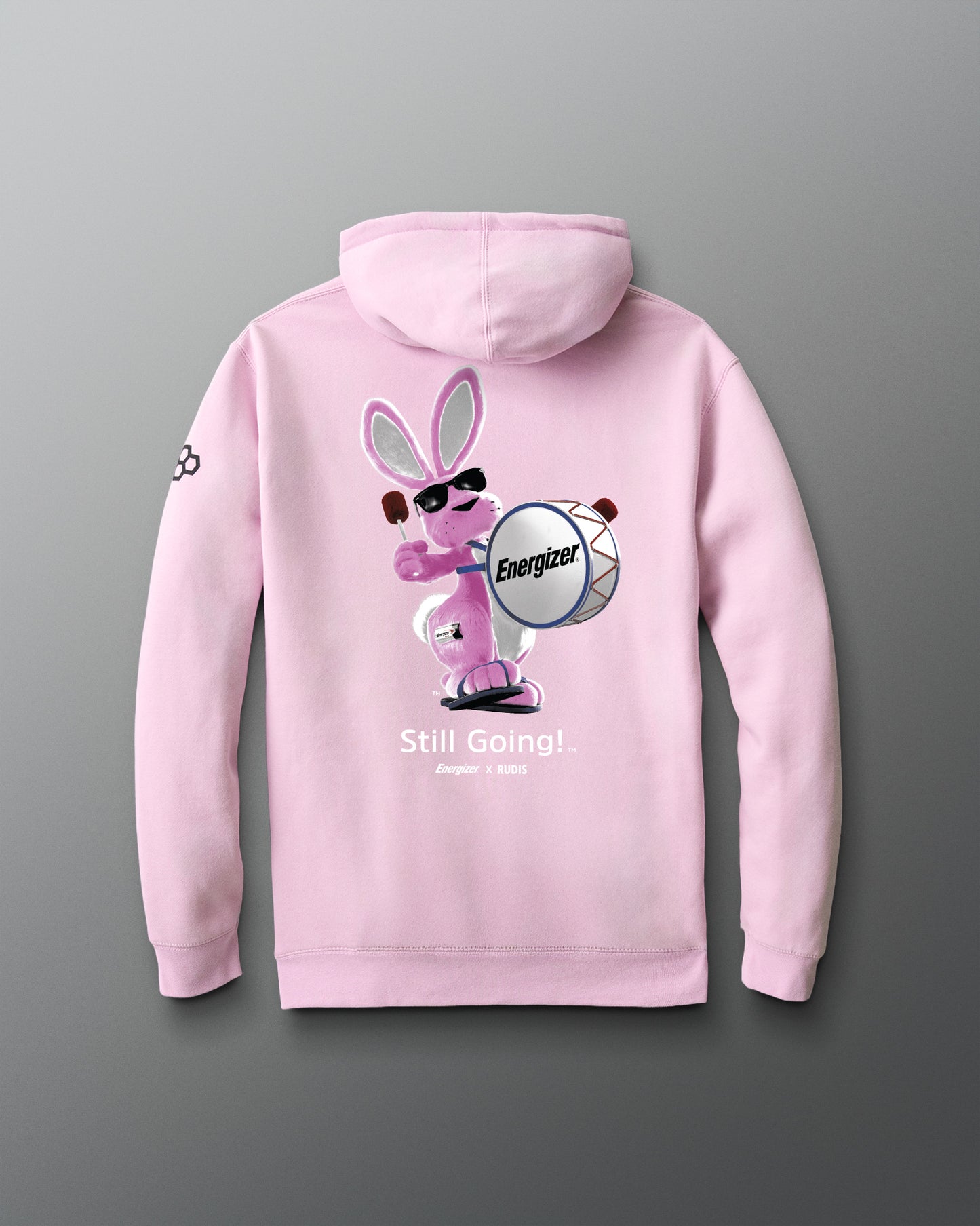 Pink hoodie with a graphic of a bunny holding an Energizer battery on a gray background