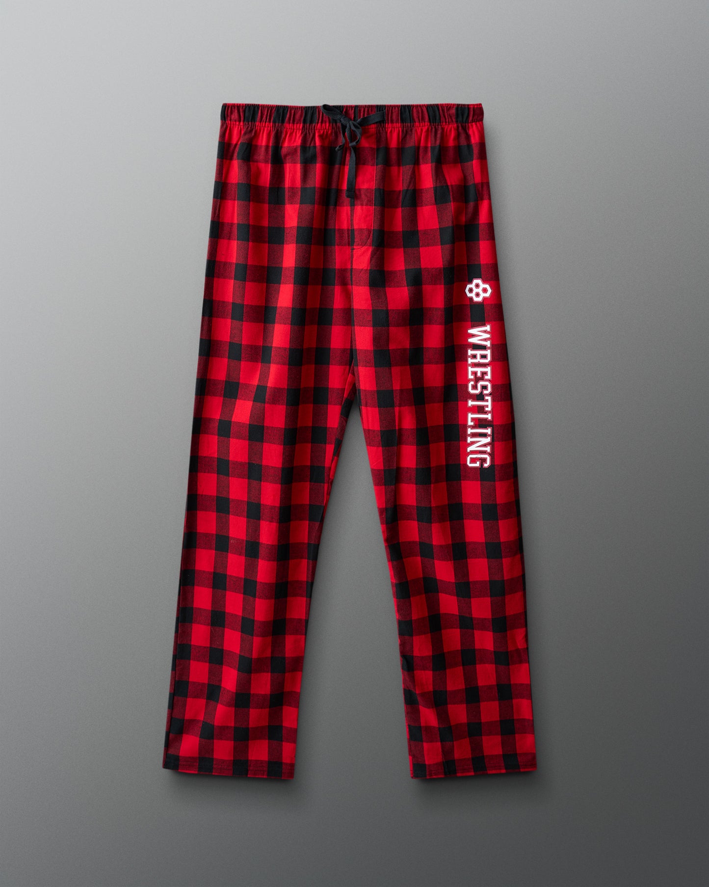 Red and black checkered pants with 'Wrestling' text on a gray background