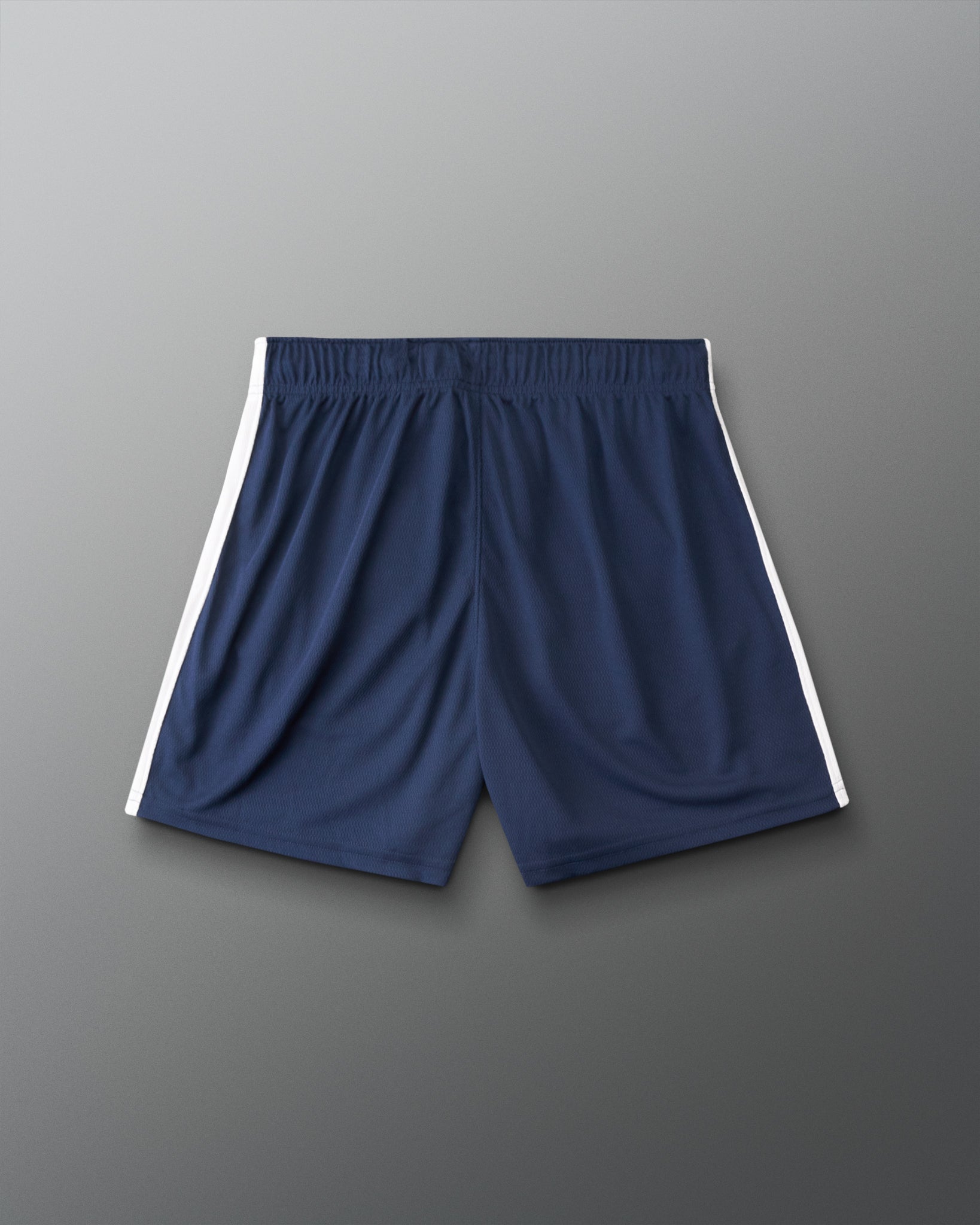 Navy blue athletic shorts with white side stripes, shown flat against a gray gradient background.