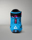 A single high-top wrestling shoe in bright blue with black, pink, and white graphics, including the brand name GODZILLA on a black strap and a white triangle logo on the toe area, photographed against a neutral gray background.