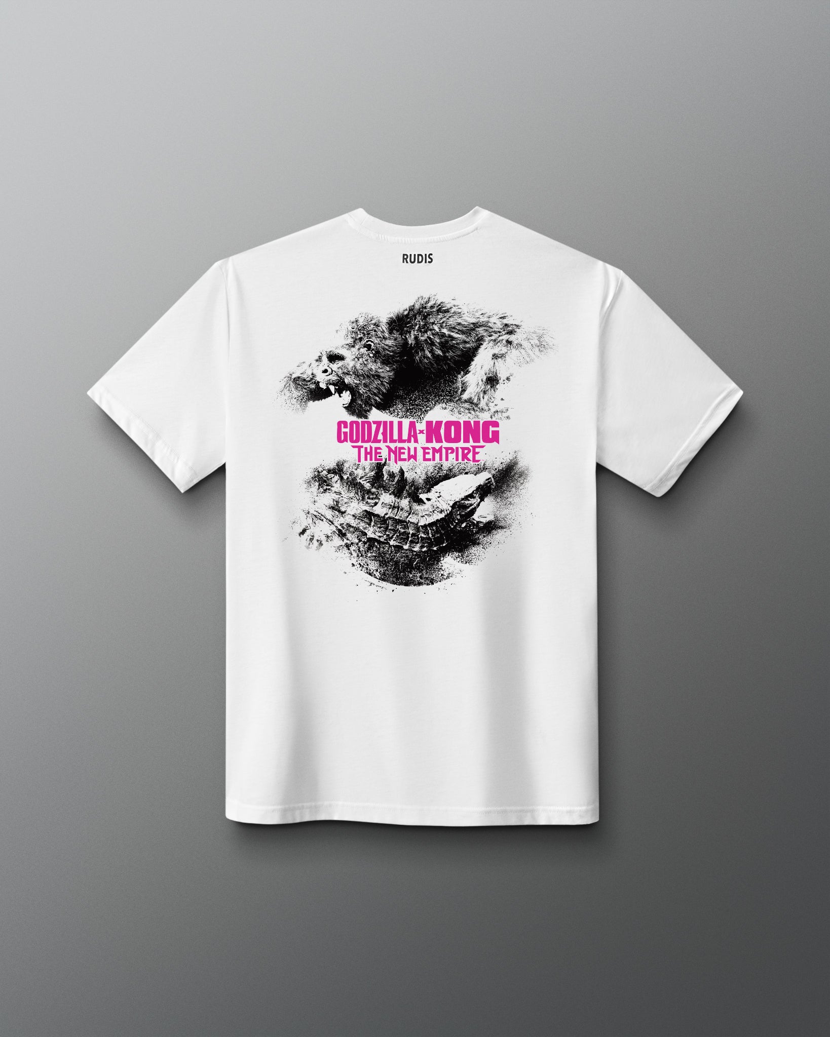 White short-sleeve t-shirt with a black and pink graphic print of Godzilla and the text 'GODZILLA-KONG THE NEW EMPIRE' on the front, shown against a gray gradient background.