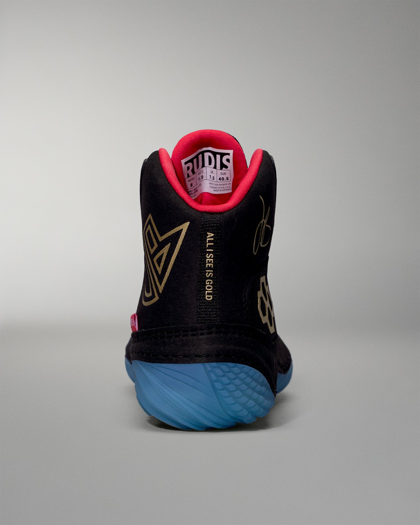 Black wrestling shoe with red lining and blue sole on a gray background