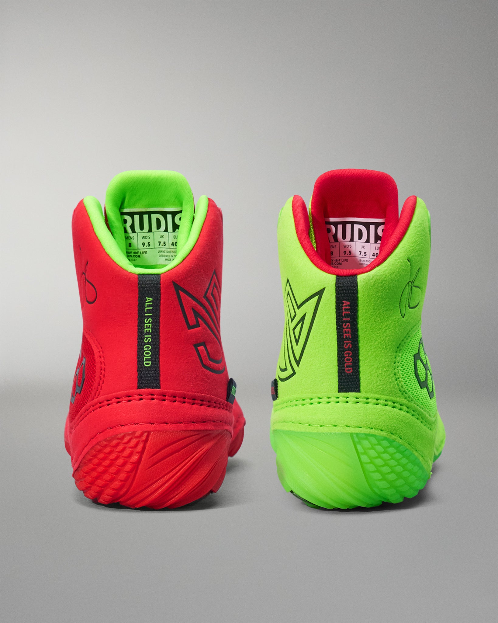 Red and green Wrestling shoes with visible branding on a gray background
