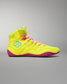 Neon yellow and pink Wrestling shoe on a gray background