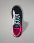 Black and pink wrestling shoe with white laces on a gray background
