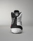 Black and white Jordan Burroughs Wrestling shoes with visible branding on a gray background