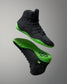 Black Wrestling shoes with green soles on a gray background