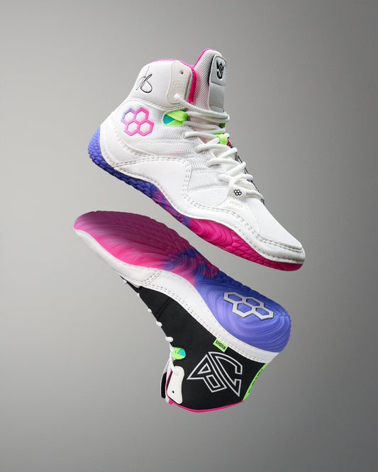 Colorful wrestling shoes with a gray background