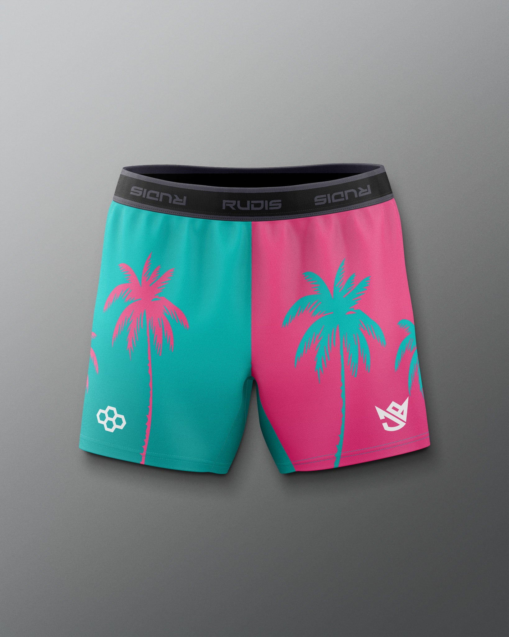 Colorful shorts with palm tree design on a gray background