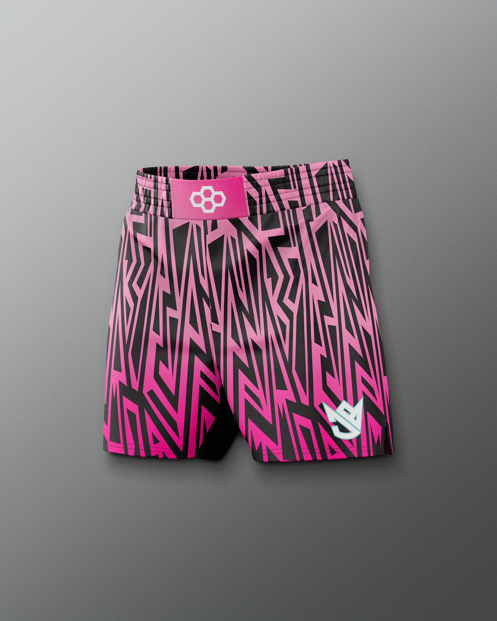 Pink and black patterned shorts with a logo on a gray background