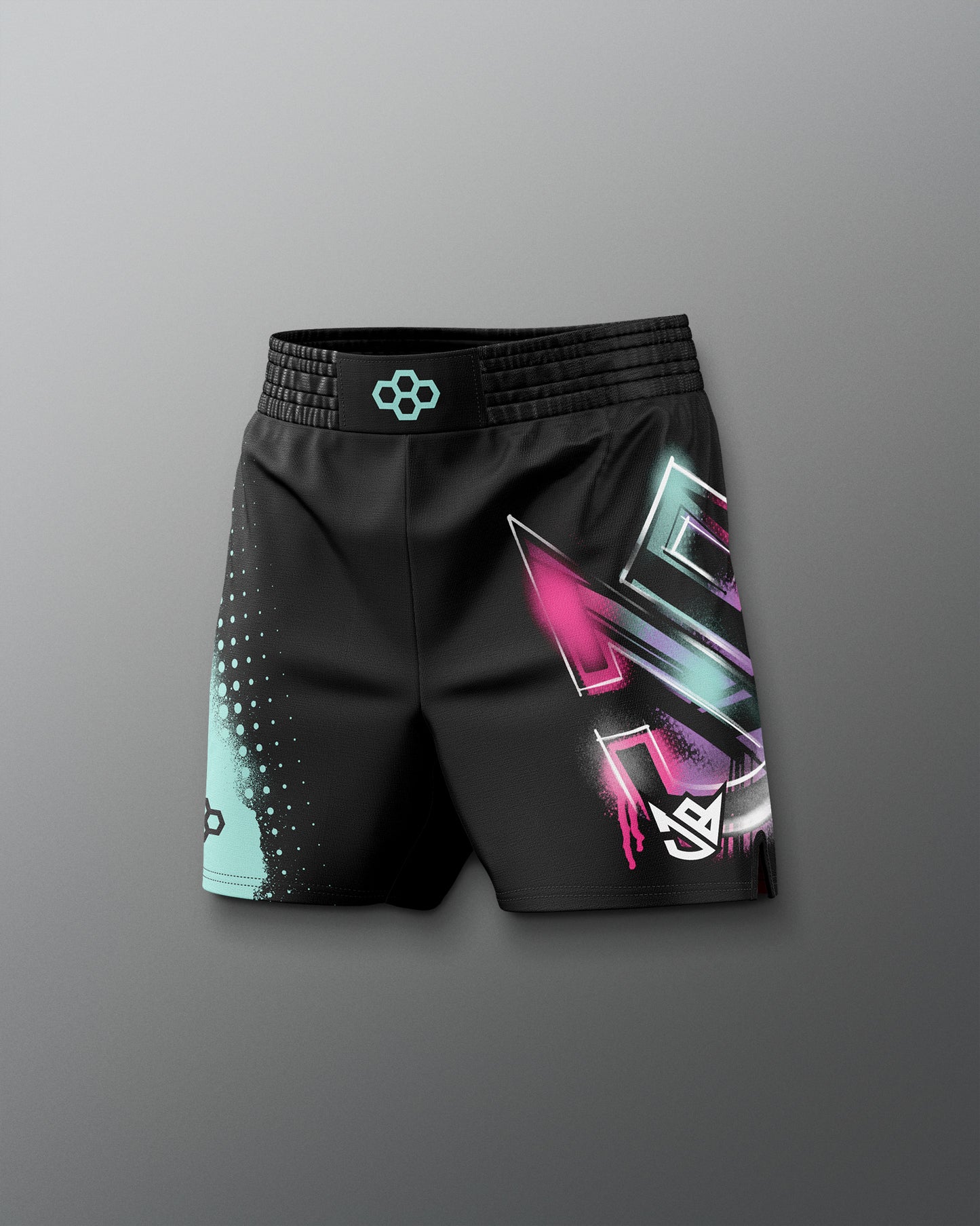 Black shorts with colorful geometric design on a gray background