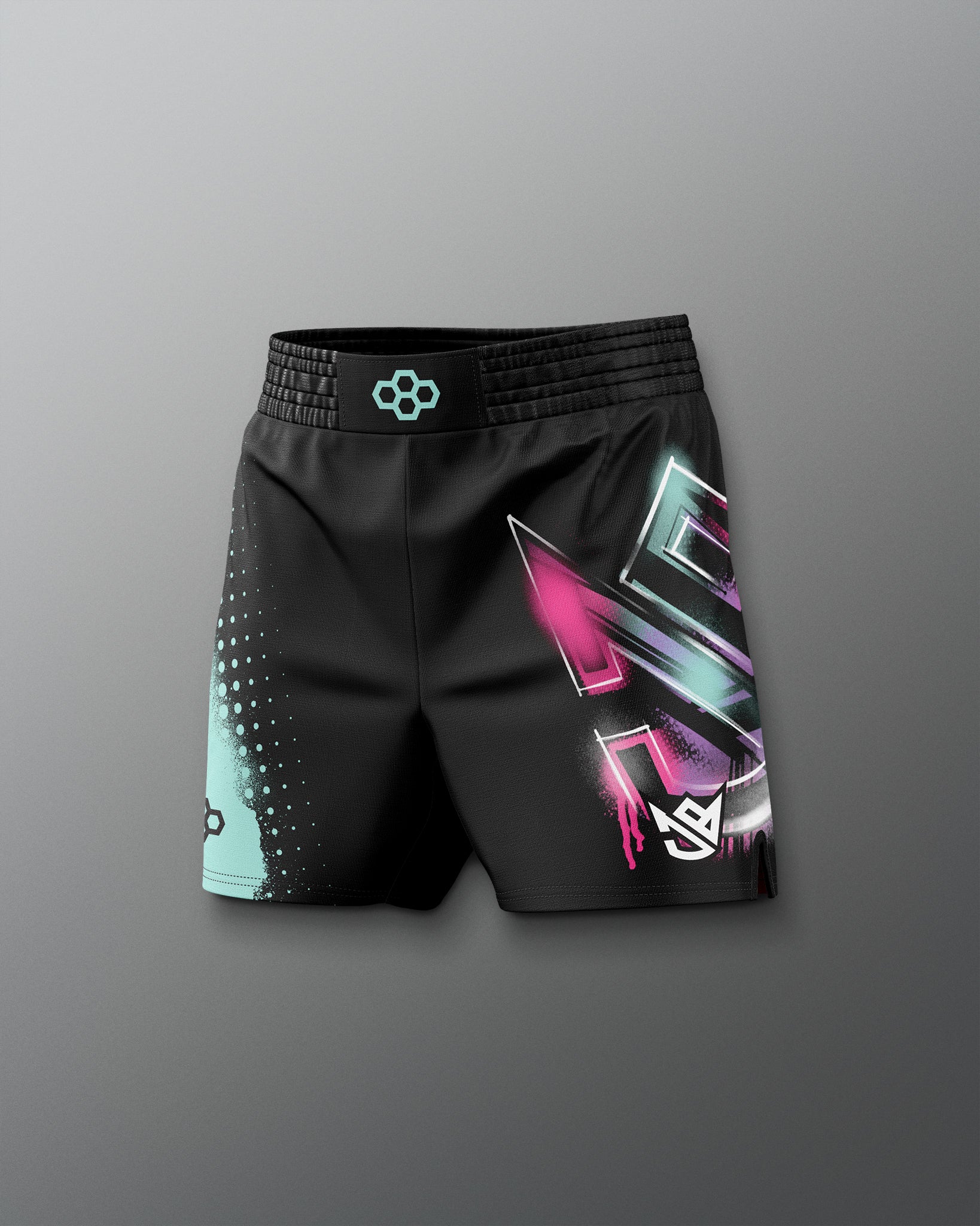 Black shorts with colorful geometric design on a gray background