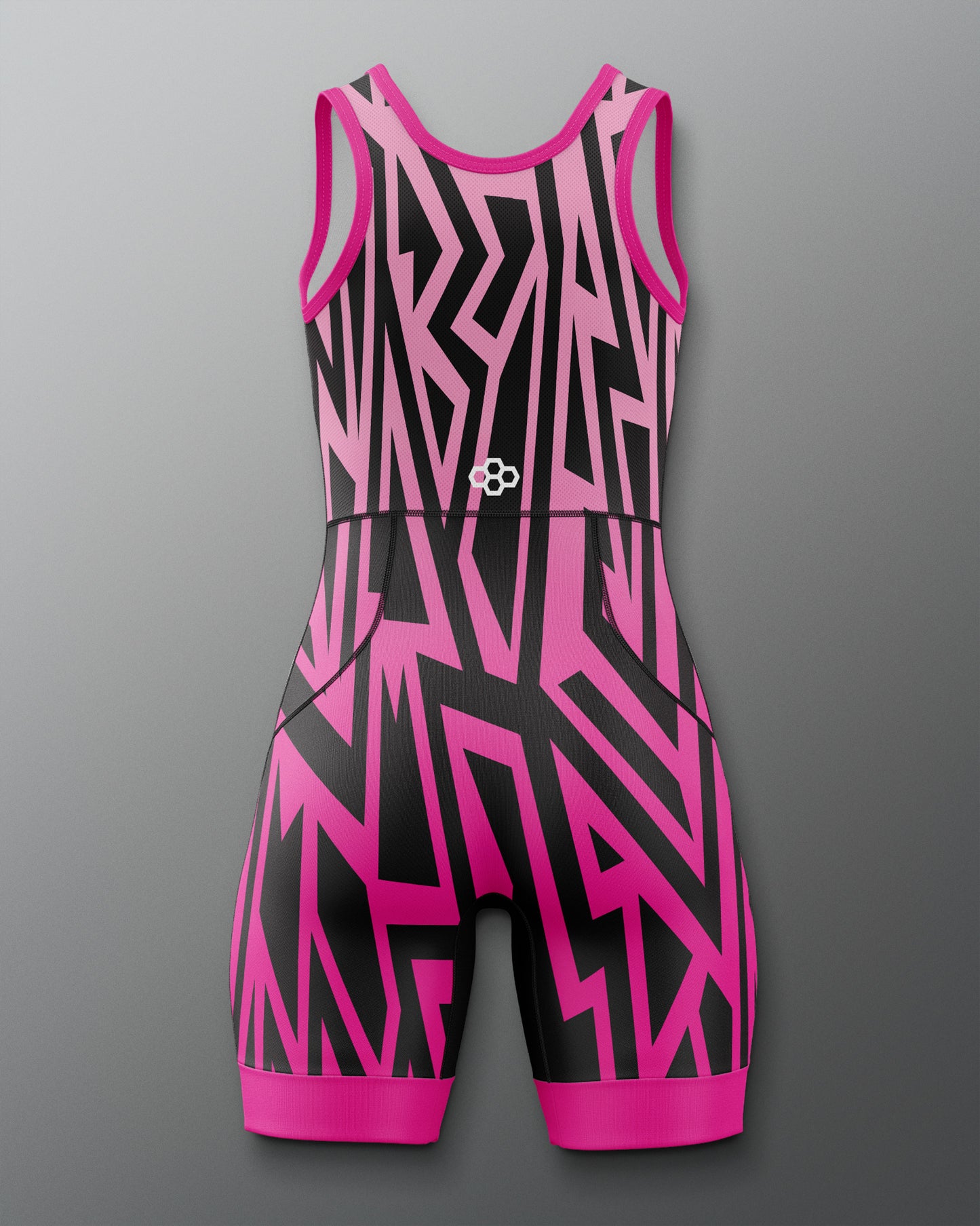 Pink and black patterned swimsuit on a gray background