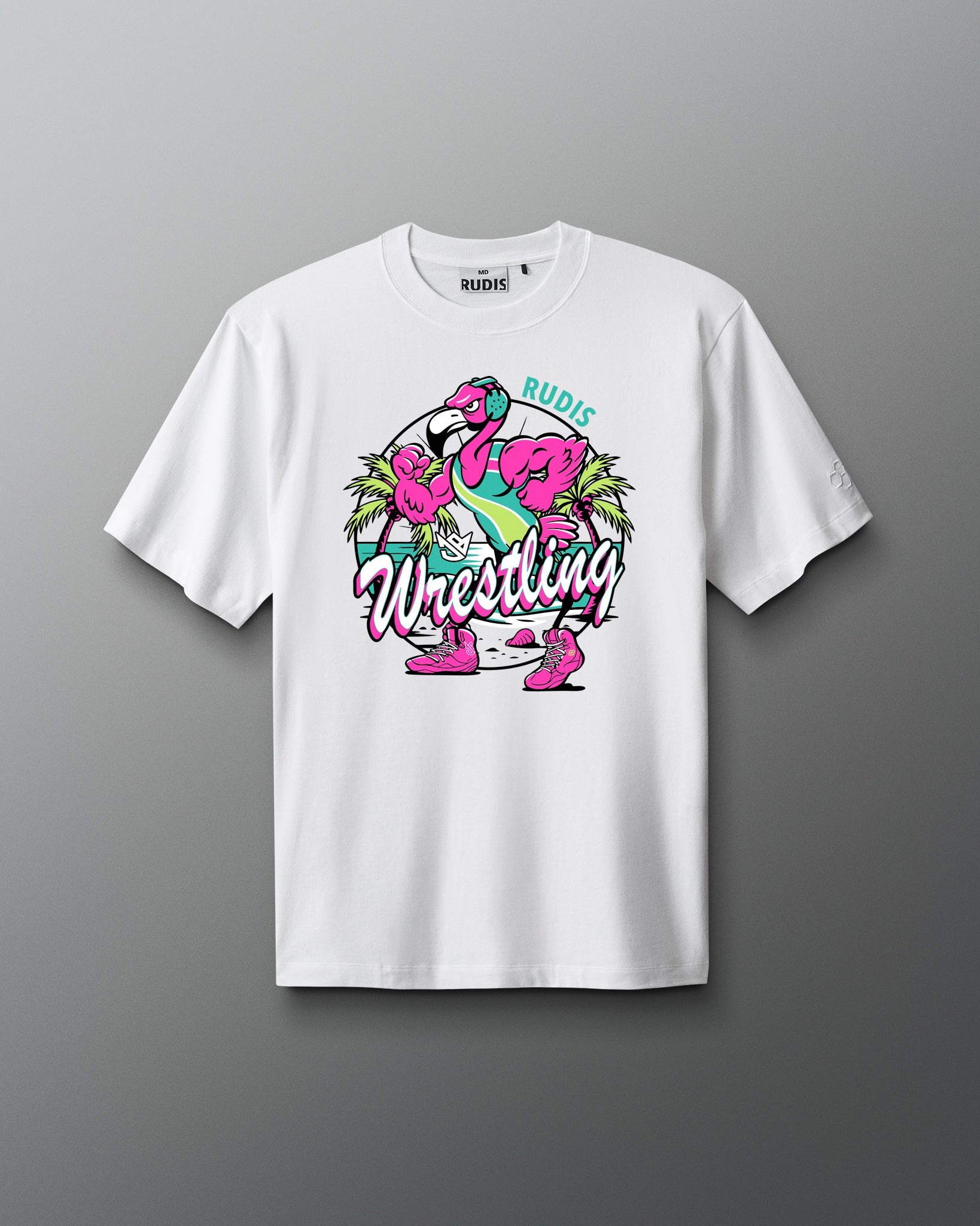 White t-shirt with flamingo graphic and 'Rudie Wrestling' text on a gray background