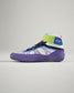 A modern high-top sneaker featuring a vibrant design with a white mesh upper multicolored accents and a distinctive purple sole