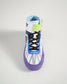 A top view of a vibrant wrestling shoe featuring a unique design with purple accents black laces and a padded collar for support