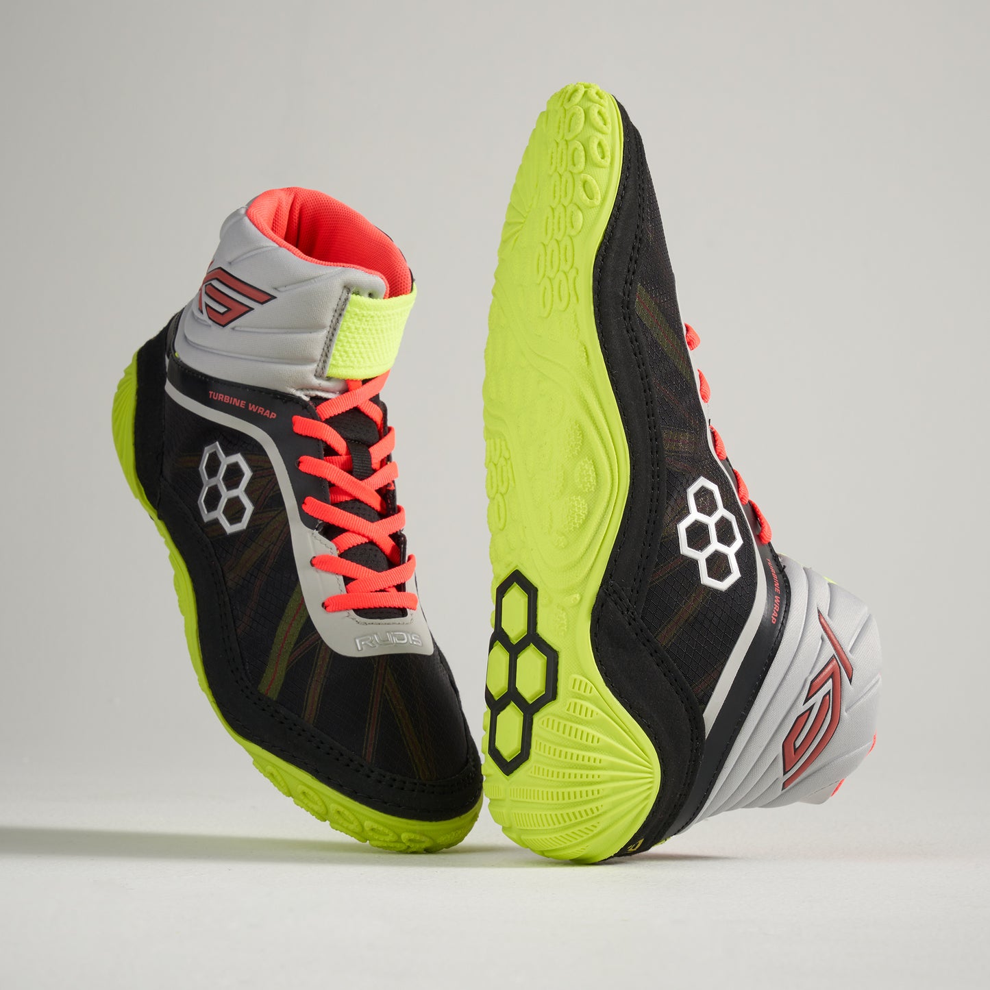 A pair of high-performance black athletic shoes featuring vibrant neon accents and a dynamic design suitable for competitive sports