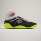 A modern black athletic shoe with vibrant accents designed for performance and style