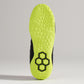 A vibrant black athletic shoe sole featuring a bright yellow outsole with textured patterns for enhanced grip