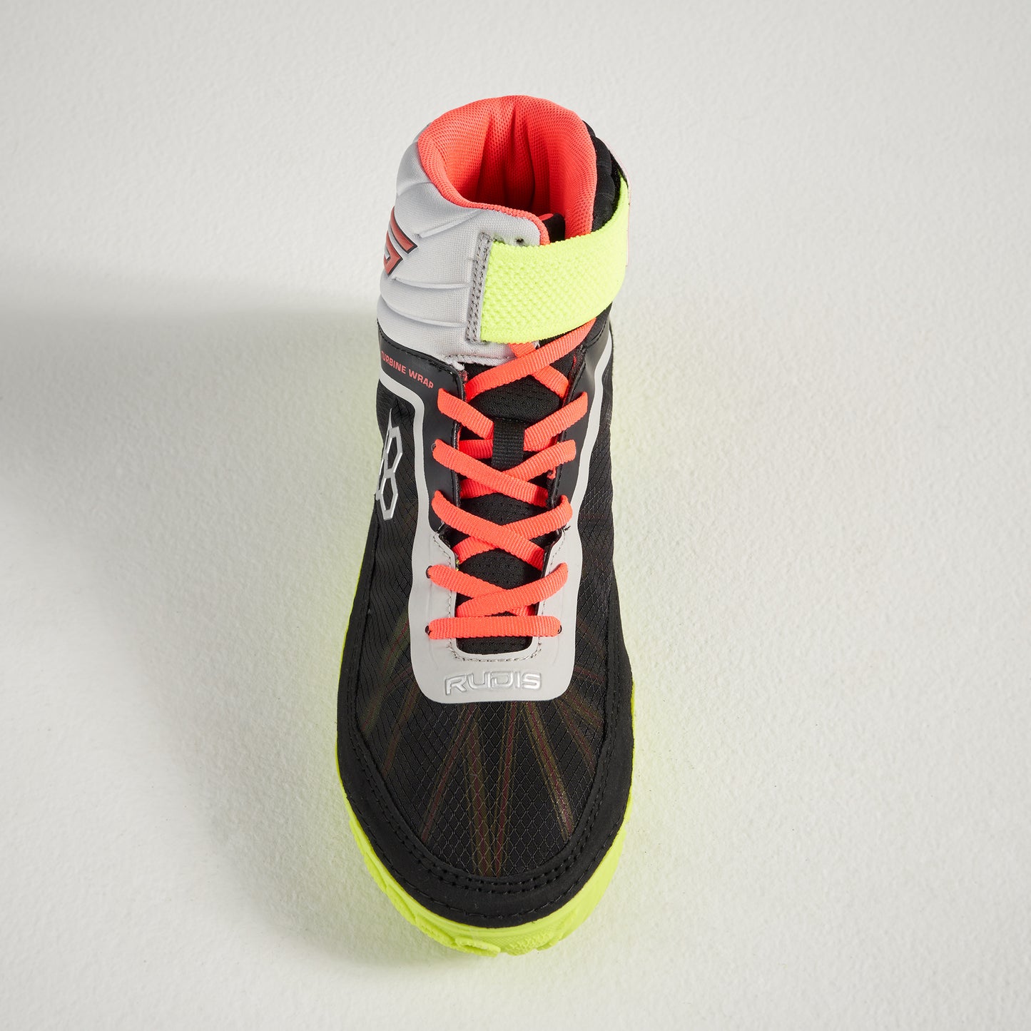 A high-performance black athletic shoe featuring vibrant neon accents and innovative design elements for enhanced performance and style