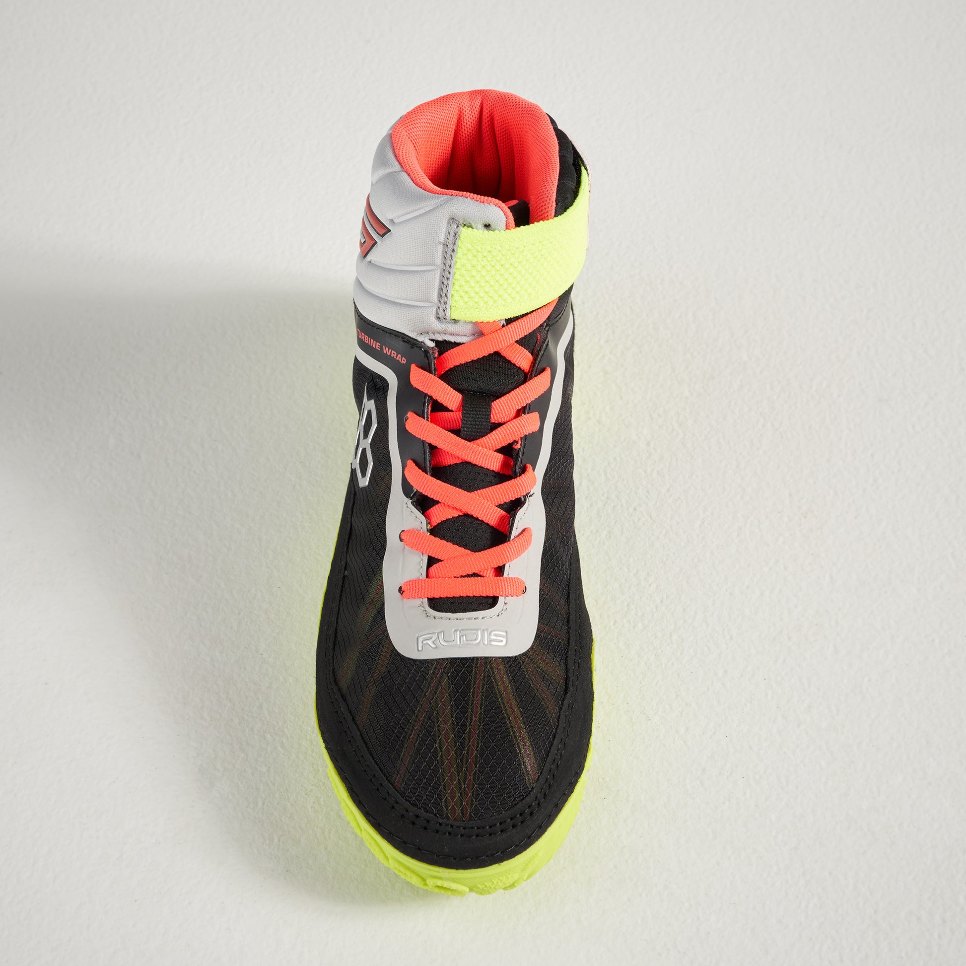 A high-performance black athletic shoe featuring vibrant neon accents and innovative design elements for enhanced performance and style