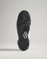 The image displays the sole of a modern athletic shoe showcasing its intricate tread patterns and textured grip for enhanced performance