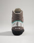 A back view of a stylish wrestling shoe featuring a mix of brown and gray colors with a prominent logo and unique design elements that enhance both aesthetics and performance