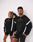 Male and female athletes wearing the RUDIS Lacrosse Colorblock Crewneck in Blackout featuring premium heavyweight fleece, bold colorblock paneling, minimalist Lacrosse chest graphic, and relaxed athletic fit.