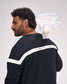 Rear view of the RUDIS Lacrosse Colorblock Crewneck in Blackout featuring the signature white back panel with "A Way of Life" branding and athletic colorblock design.