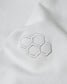 Close-up of the embroidered RUDIS hex logo on the sleeve of the Lunar Lacrosse Elite Terry Hoodie, highlighting premium craftsmanship and clean athletic styling.