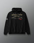 Black hoodie with 'Resolute Lacrosse' branding on a gray background