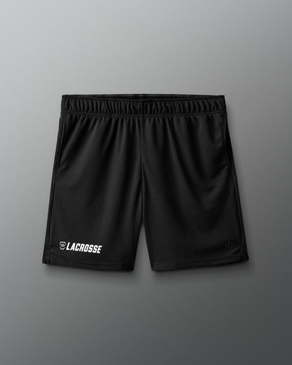 Black lacrosse shorts on a gray background