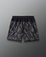 RUDIS Resolute Attack lacrosse shorts in black with a tonal camo print, featuring an elastic waistband, side pockets, Rocket logo on the left leg, and RUDIS logo on the right leg.