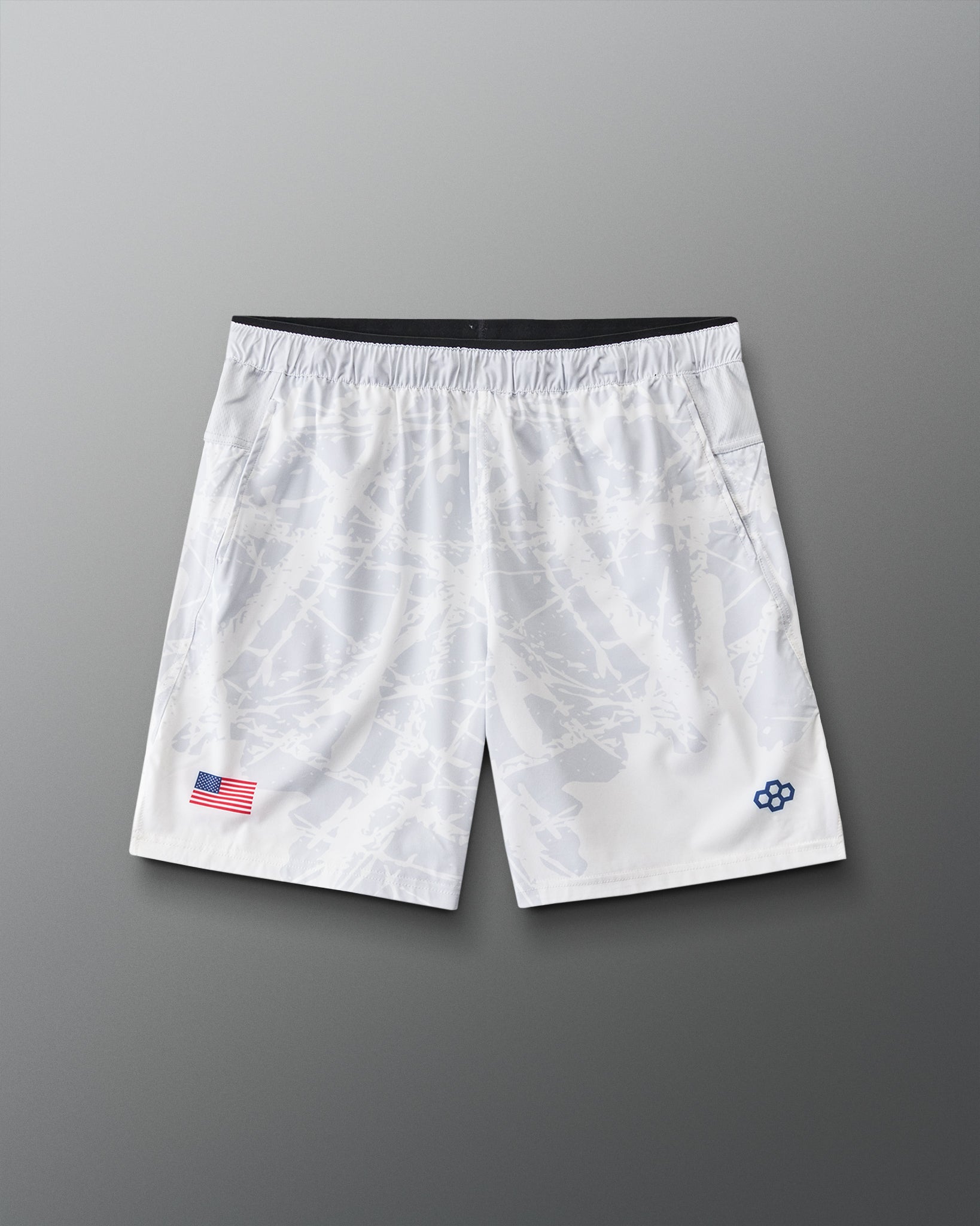 Front view of RUDIS Lacrosse Flag 7" Attack Shorts in white with tonal graphic print, American flag detail, and RUDIS logo.