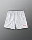Back view of RUDIS Lacrosse Flag 7" Attack Shorts in white with tonal graphic print and “Land of the Free, Home of the Brave” detail.