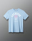 Light blue t-shirt with lacrosse graphic and text on a gray background