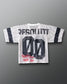 Back of the RUDIS Resolute Throwback lacrosse jersey in white mesh with black sleeve stripes, oversized "00" number, "RESOLUTE" nameplate, and red "Never Stop Never Quit" graphic near the hem.