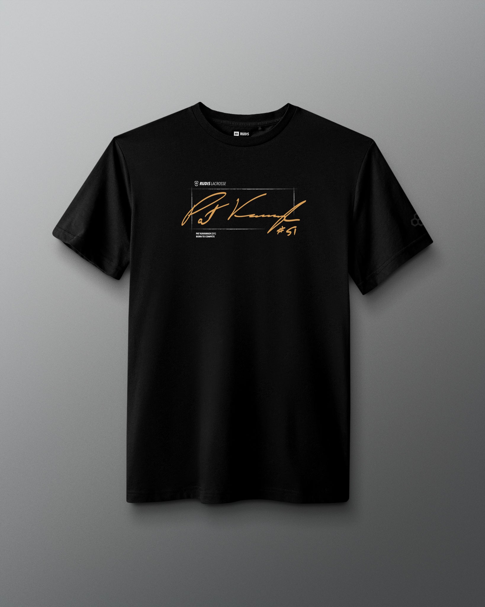 A black short-sleeve crewneck t-shirt featuring a gold signature graphic and small white text on the chest, displayed against a dark gray gradient background.