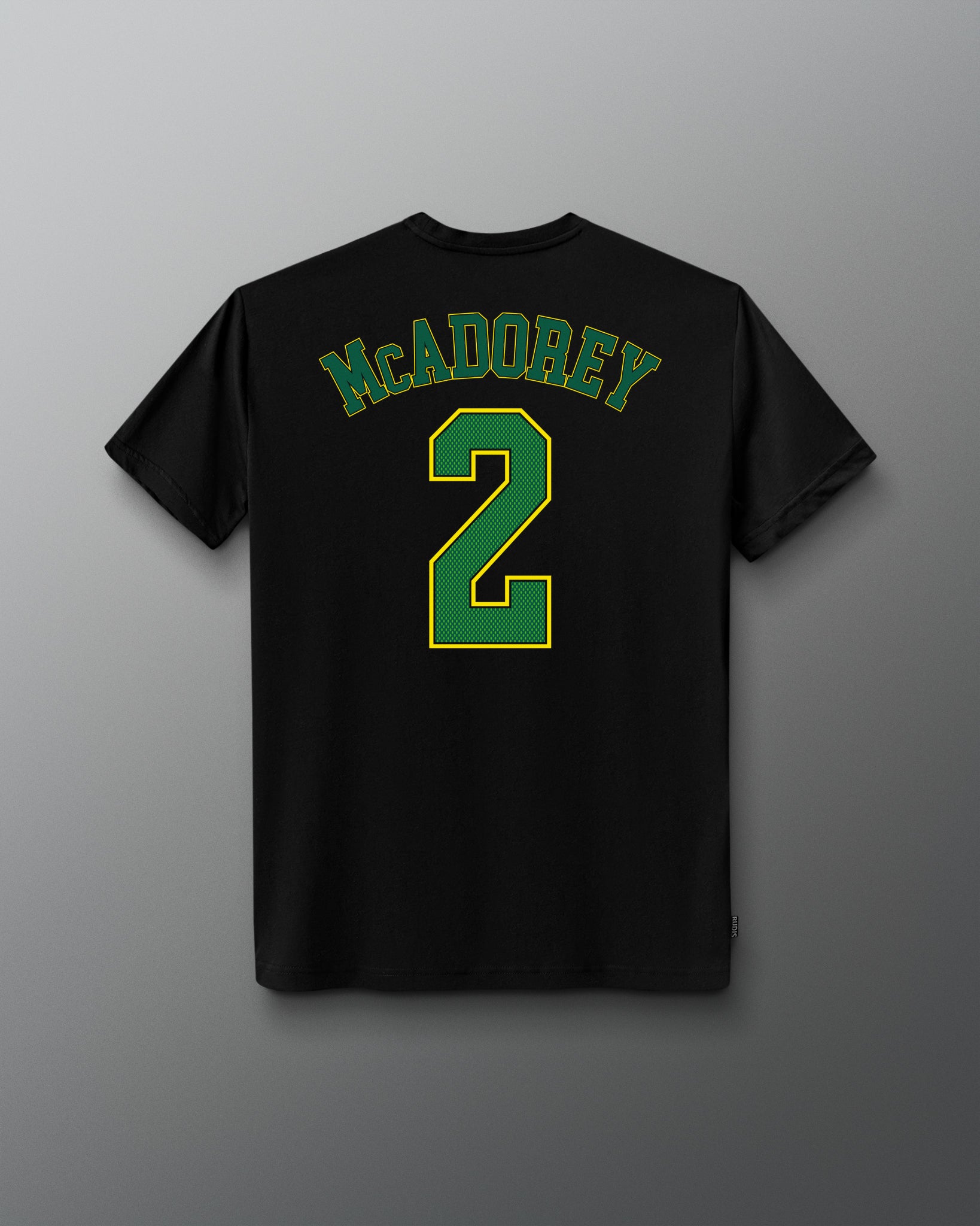 Back view of the black RUDIS McAdorey Jersey Supersoft T-Shirt featuring McADOREY lettering and a large green number 2 graphic.