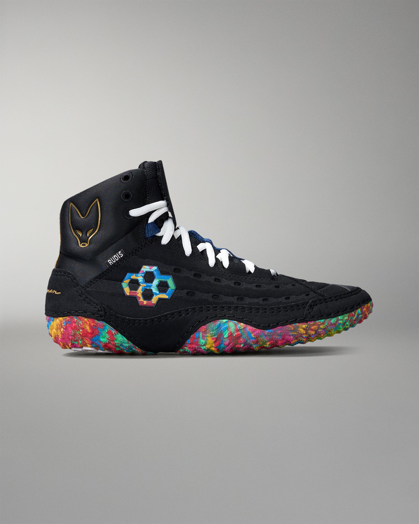 Black wrestling shoe with colorful sole on a gray background