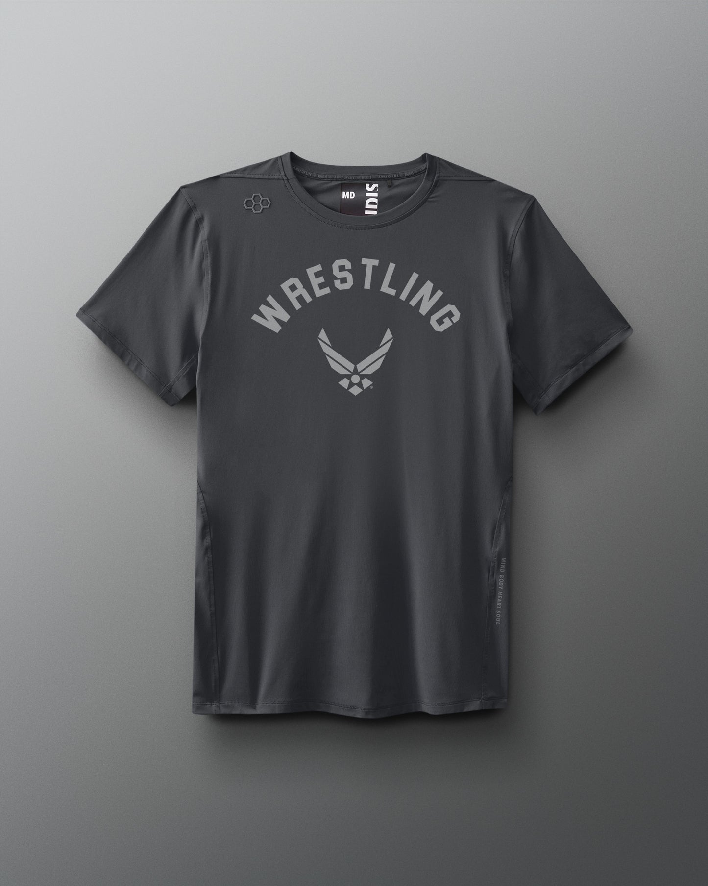 Front view of a dark gray RUDIS T-shirt featuring the word ‘WRESTLING’ arched above the U.S. Air Force logo in a tonal print across the chest.