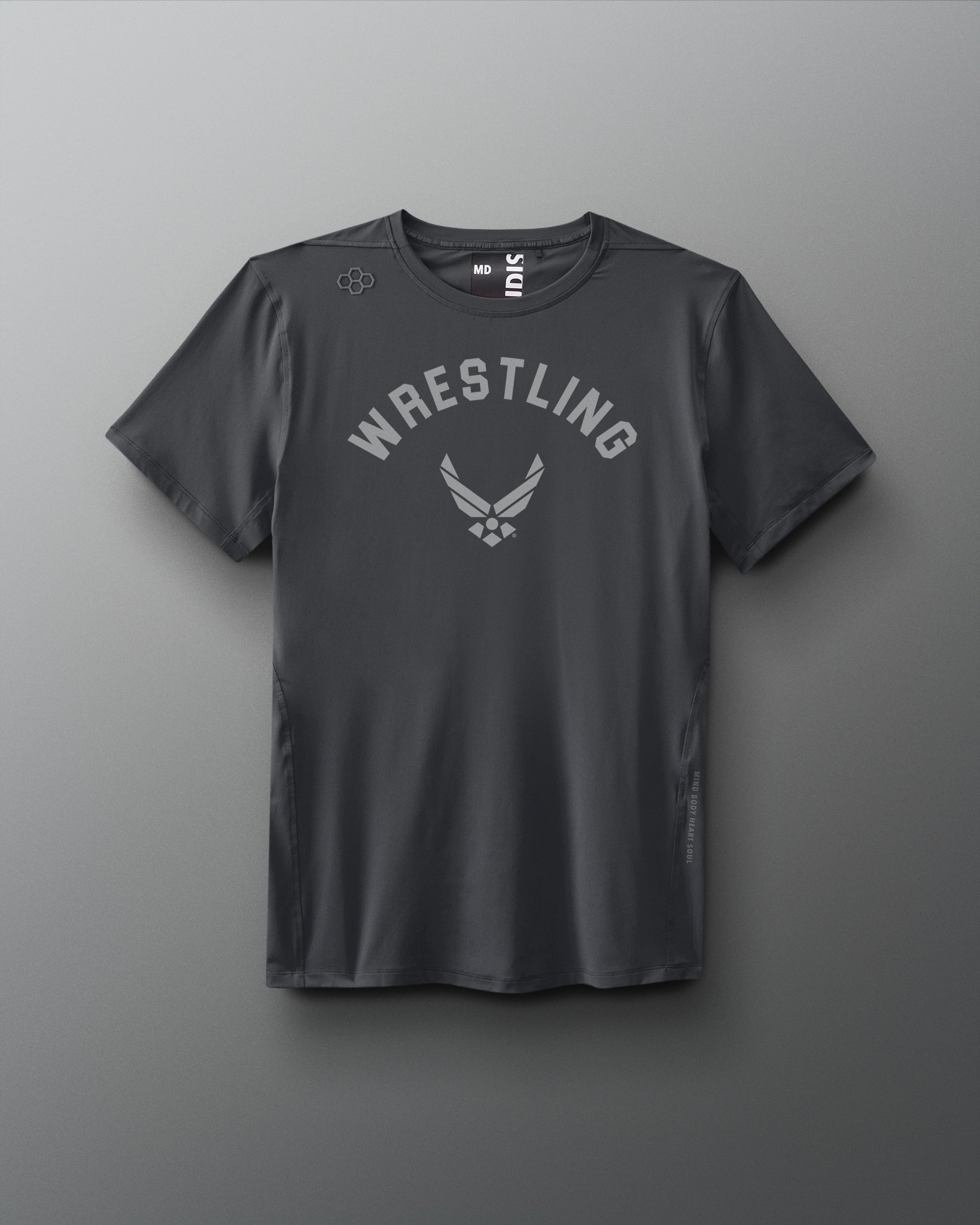 Front view of a dark gray RUDIS T-shirt featuring the word ‘WRESTLING’ arched above the U.S. Air Force logo in a tonal print across the chest.