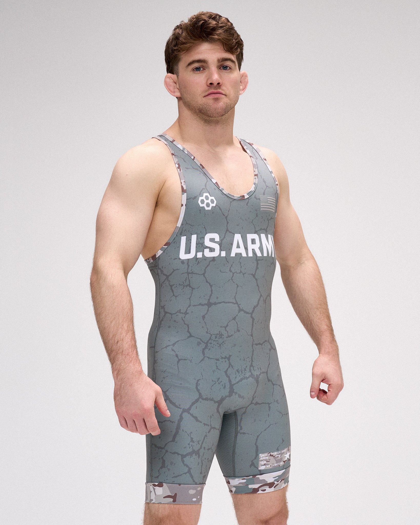 Person wearing a U.S. Army branded gray wrestling singlet on a white background