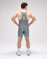 Person wearing a gray wrestling singlet with star design on a white background