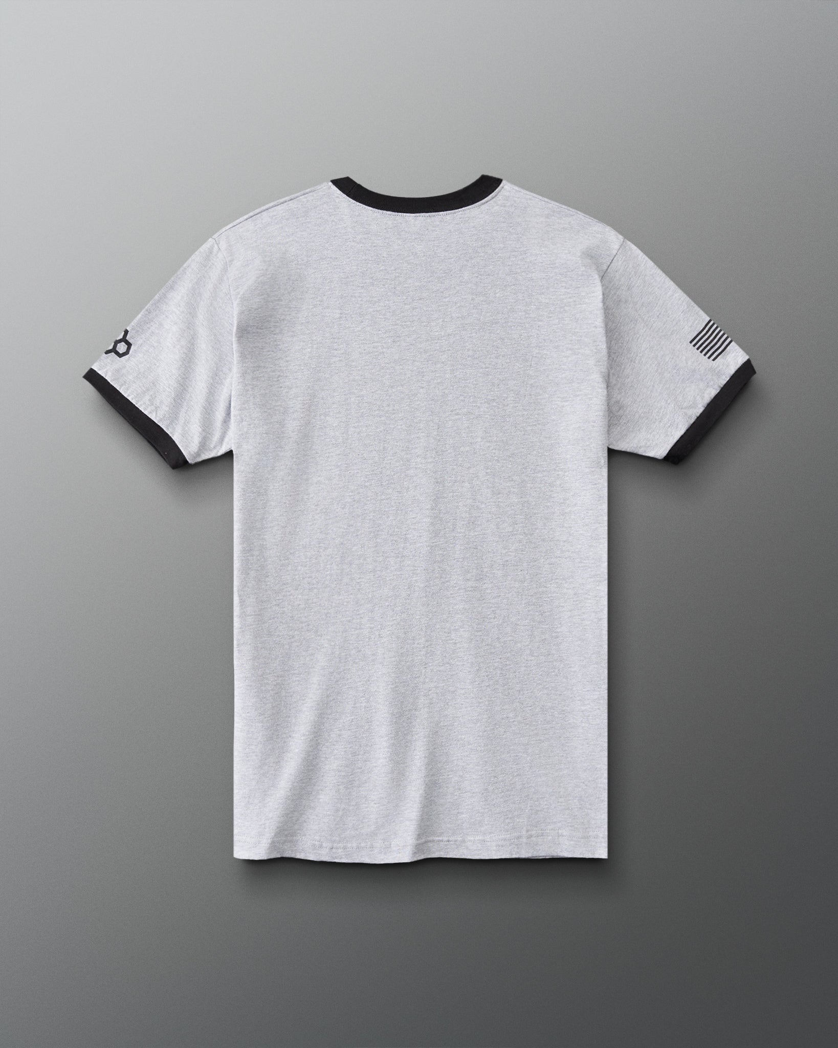 RUDIS U.S. Army Ringer T-Shirt in Athletic Gray/Black, back view showing heather gray fabric, black collar and sleeve trim, RUDIS sleeve logo, and black American flag graphic.