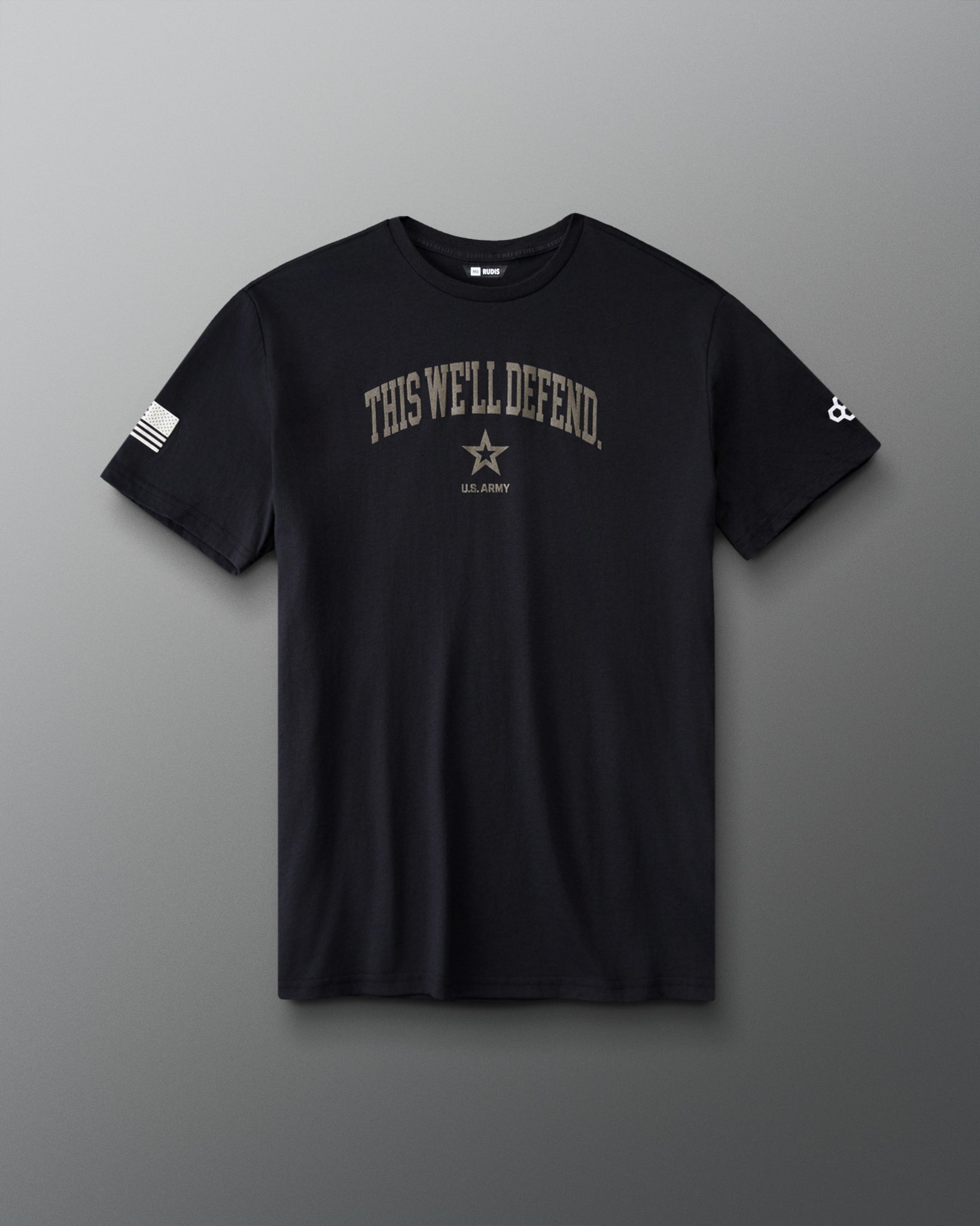 RUDIS U.S. Army Defend Elite Super Soft T-Shirt in Black, front view featuring THIS WE'LL DEFEND chest lettering, U.S. Army star emblem, American flag sleeve graphic, and RUDIS logo.