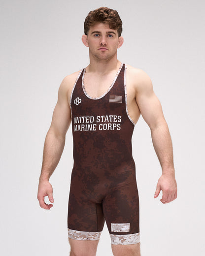 Man wearing a brown wrestling singlet with 'United States Marine Corps' text on a white background