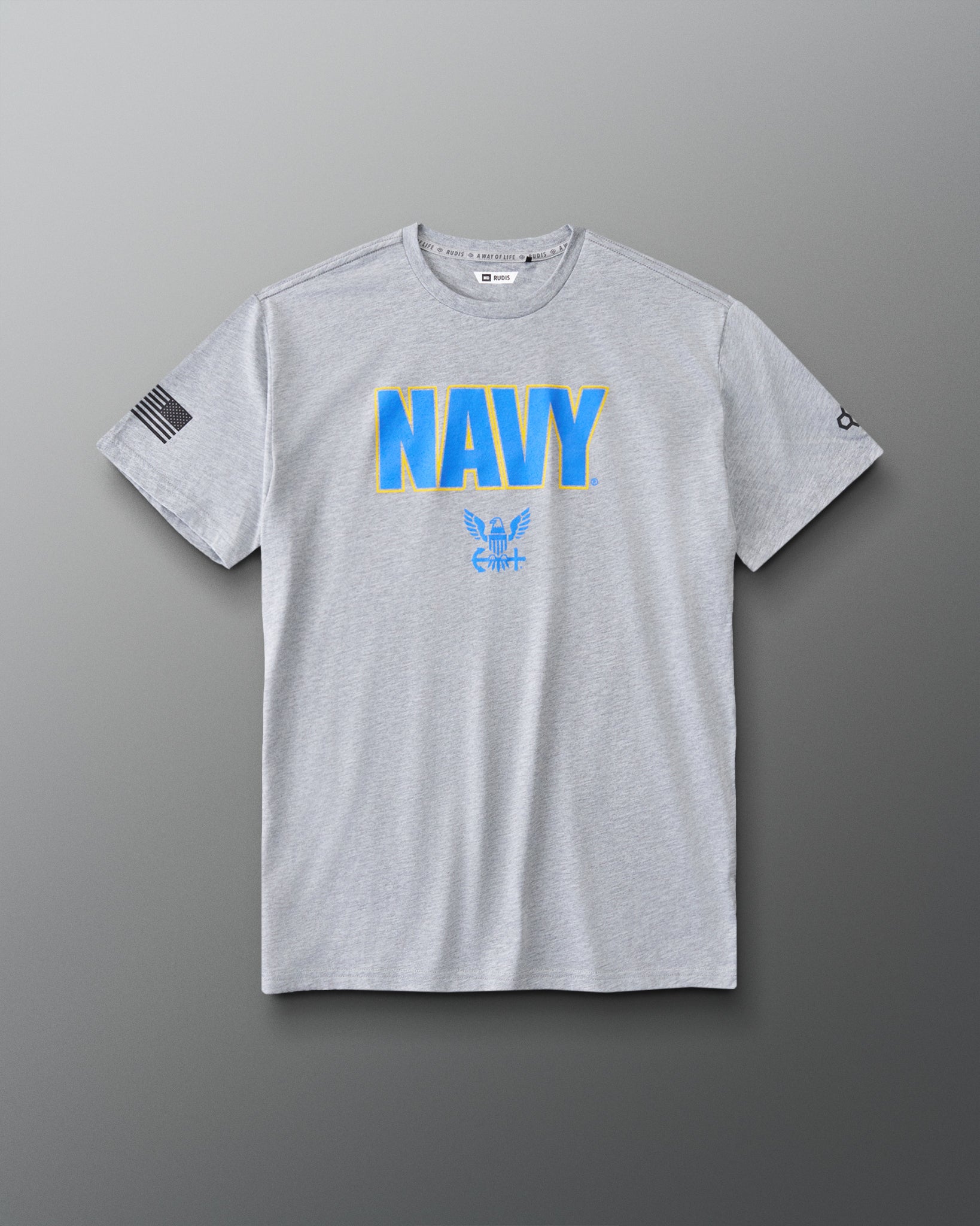 RUDIS U.S. Navy Elite Super Soft T-Shirt in Athletic Gray, front view featuring bold blue and gold NAVY lettering, eagle insignia, American flag sleeve graphic, and crew neckline. Copy Alt Text