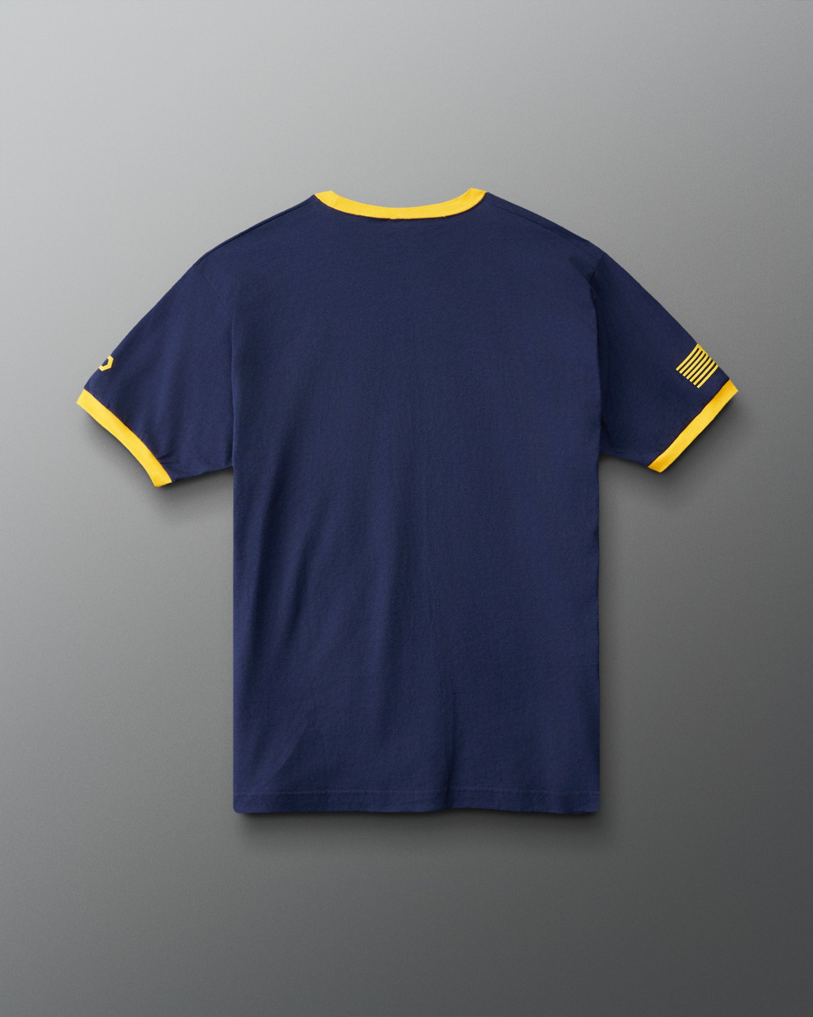 RUDIS U.S. Navy Ringer T-Shirt in Navy/Yellow, back view showing solid navy fabric, contrasting yellow collar and sleeve trim, and military-inspired sleeve graphics.