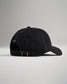A black baseball cap viewed from the back featuring a classic adjustable strap with a metal buckle